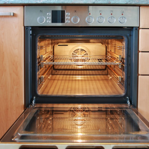 Empty open oven in the kitchen